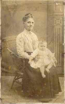 My great great grandmother Ann Shinner (b1857), nee Spencer, with one of her grandchildren.  Photo courtesy of Janet Farrow